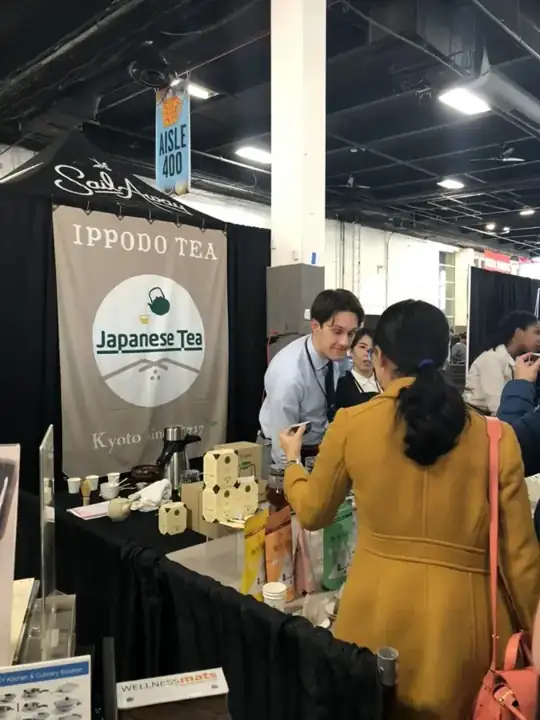 Ippodo Tea booth with a Japanese Tea banner at the 2019 Coffee and Tea Festival in Brooklyn